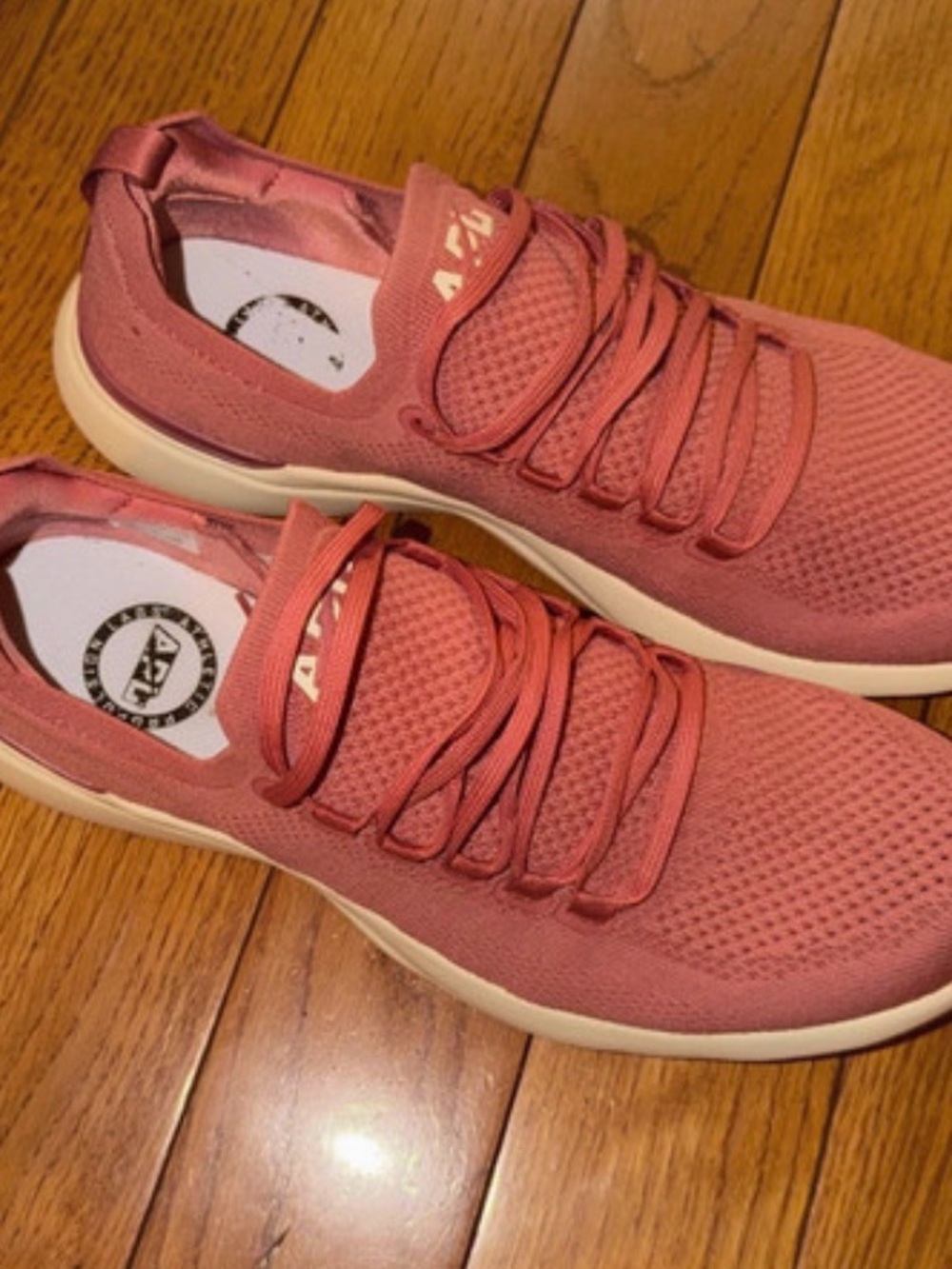 APL salmon colored men’s shoes